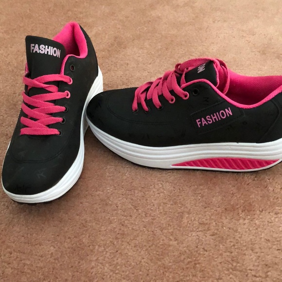 stacked tennis shoes